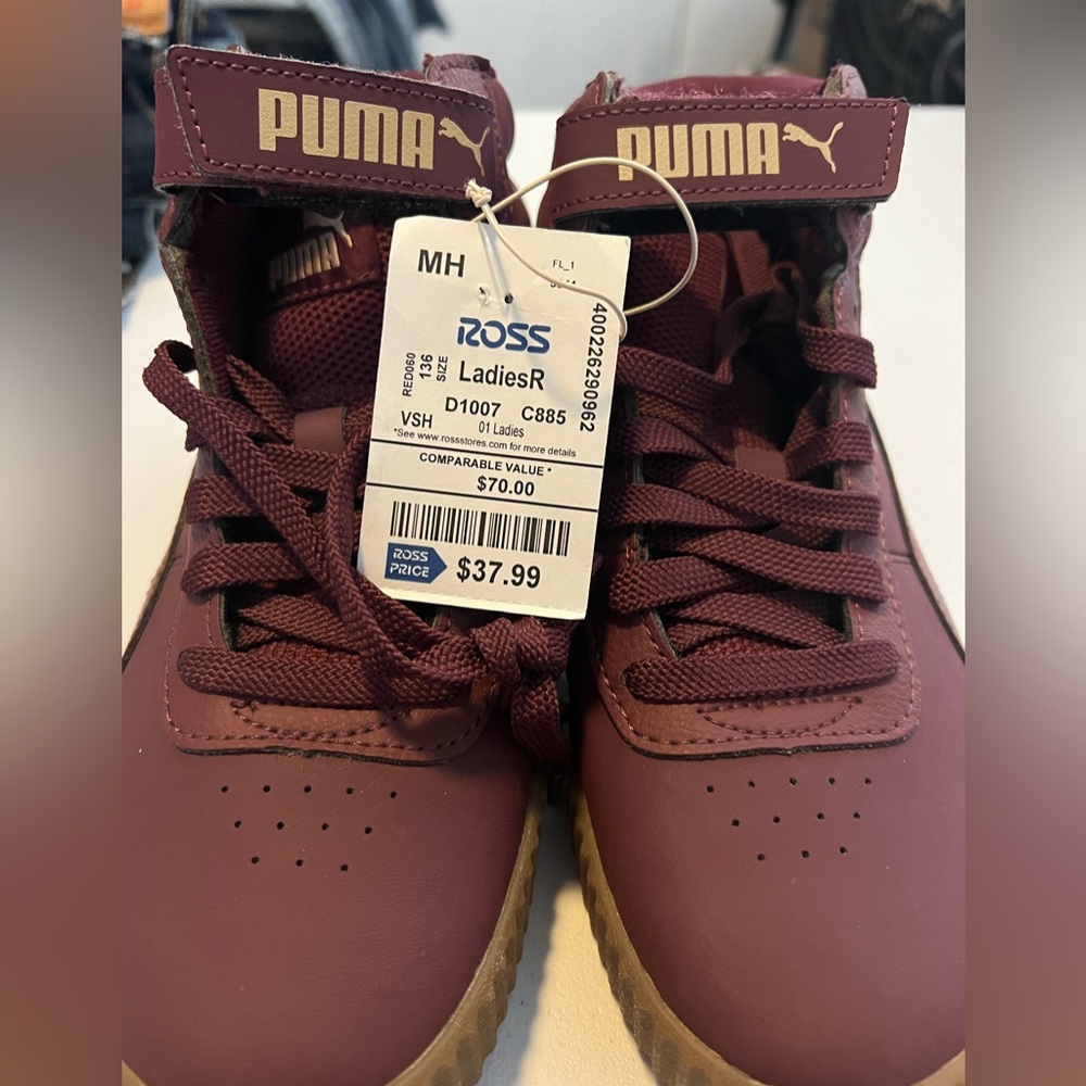 Pumas! Brand new with tag and no box! Carina Mid sneaker Plum color